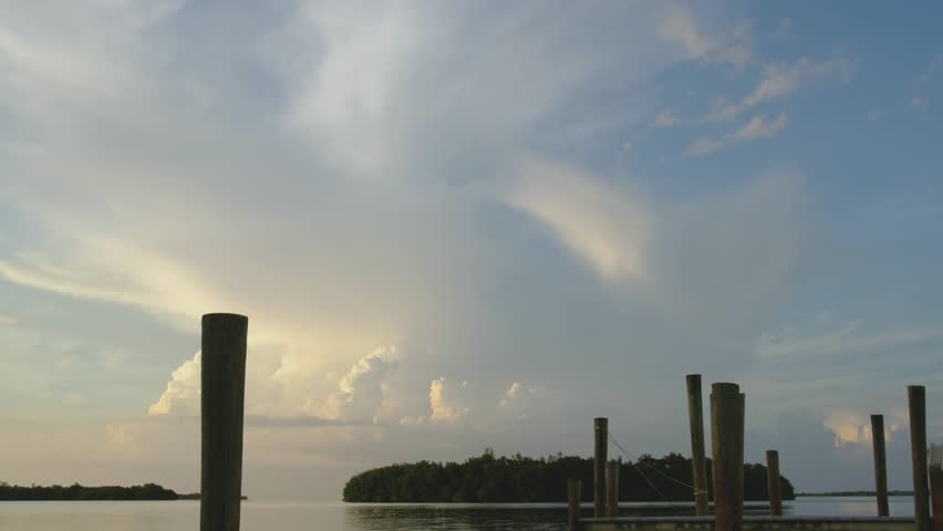 Island dock off the coast of Florida during sunrise
