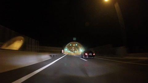 Driving car with adaptive headlights through a tunnel