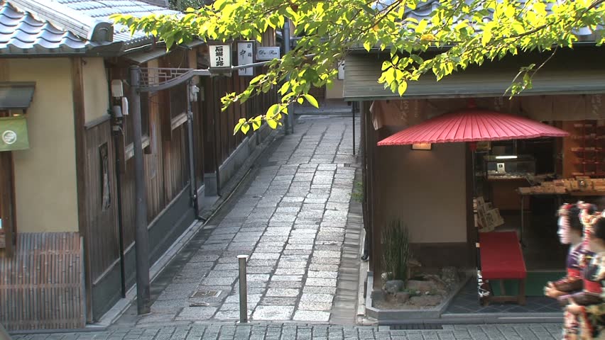 GION, KYOTO, JAPAN - CIRCA 2012: Geishas and people