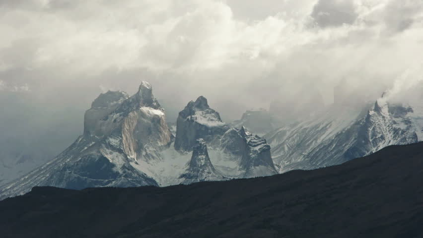 Clouds roll over Torres del Paine in Patagonia 