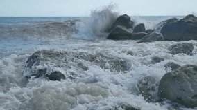 Sea beach storm mountains stones nature strong waves water the landscape slow motion video