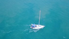 White yacht sailing in the mediterranean sea - Aerial footage