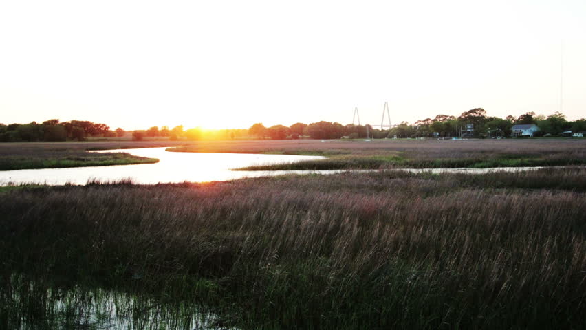 Time lapse sunset of marsh.