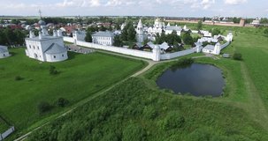 4K aerial video footage view of medieval beautiful Suzdal town, its churches, cathedrals, river Kamenka and area around it on summer day near Vladimir on Golden Ring route 240 km from Moscow, Russia
