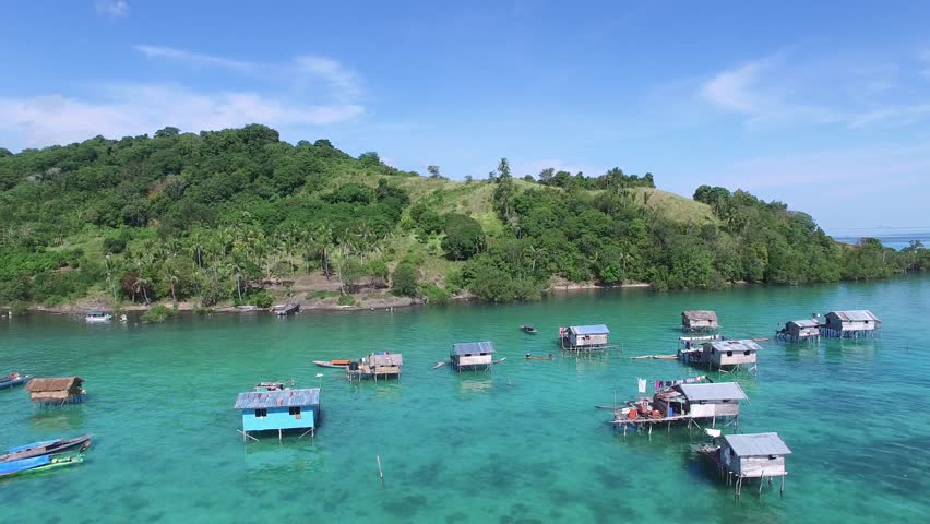 aerial, borneo sea gypsy water village in Mabul Bodgaya Island in Tun Sakaran marine park, Malaysia.