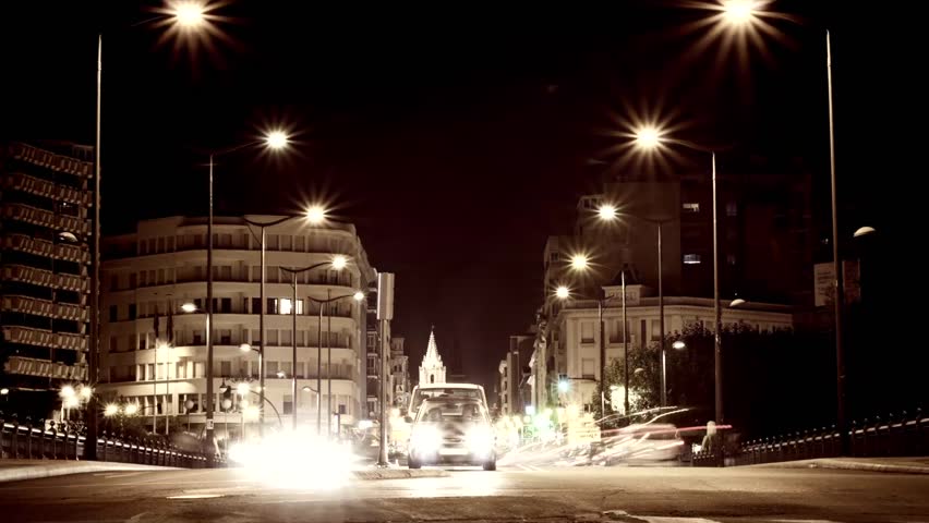 LEON, SPAIN - CIRCA 2012: Time lapse of a busy intersection at night circa 2012