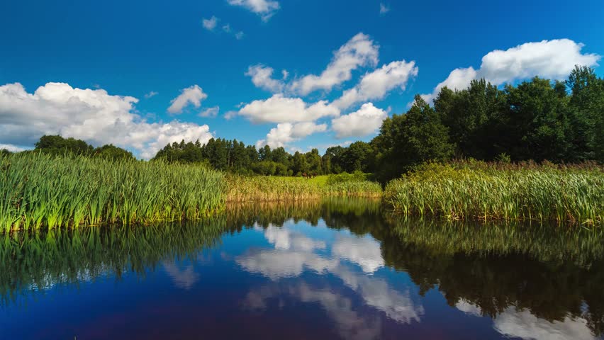 Cloudscape over lake in summer