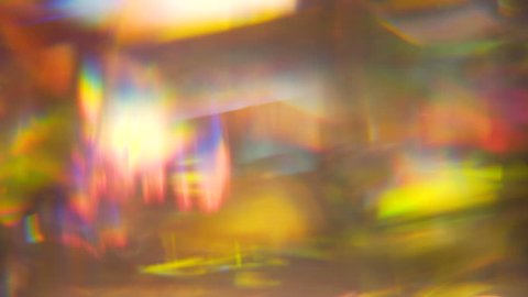This 4k macro shot of a rotating collection of stained glass is perfect as a motion background, texture, or visual effect.