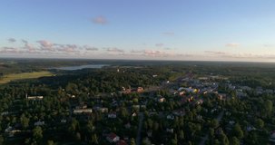 Small city, Cinema 4k aerial sideway view of Karis city, on a sunny evening dawn, in Karjaa, Raasepori, Uusimaa, Finland