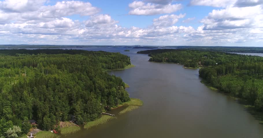 Lohjanjarvi, Cinema 4k aerial view above lohjanjarvi lake and lohjansaari island, on a sunny day, Lohja, Uusimaa, Finland