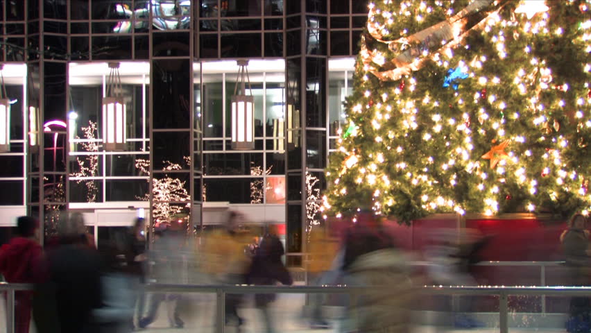 People ice skate at the rink at PPG Place in Pittsburgh, PA.