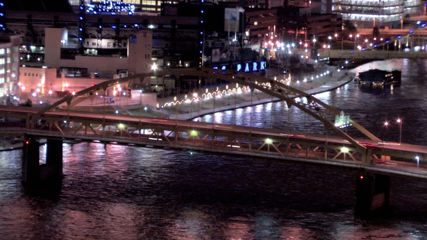 Time-lapse of traffic passing over the Fort Duquesne Bridge. Close.
