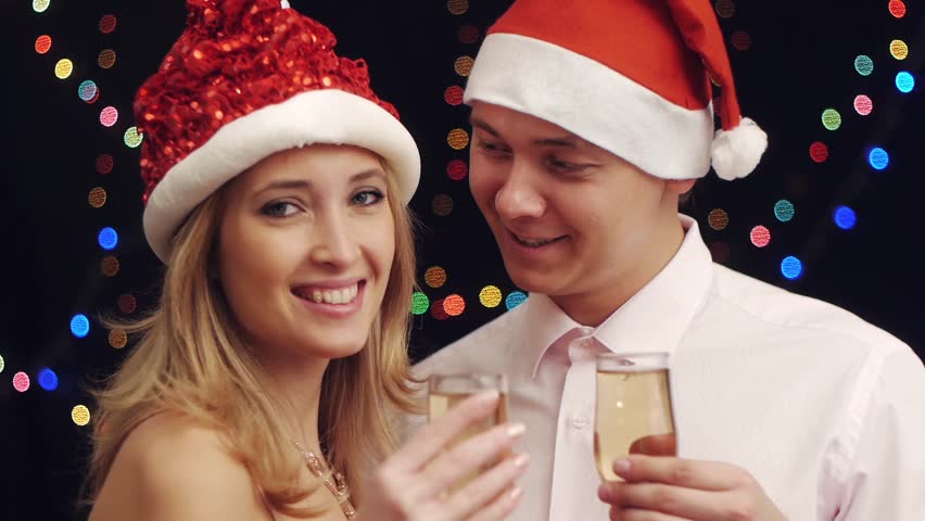 Happy attractive couple have conversation at new year party