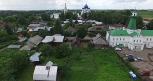 4K aerial video footage view of medieval Suzdal town and Kremlin, its churches, cathedrals, river Kamenka and area around it on summer day near Vladimir on Golden Ring route 240 km from Moscow, Russia