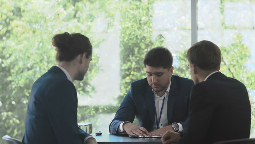 Sucessful deal between businessmen in the office