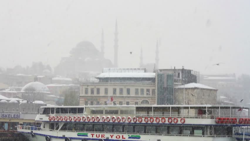 ISTANBUL - JANUARY 31: Eminonu Pier in snow on January 31, 2012 in Istanbul.