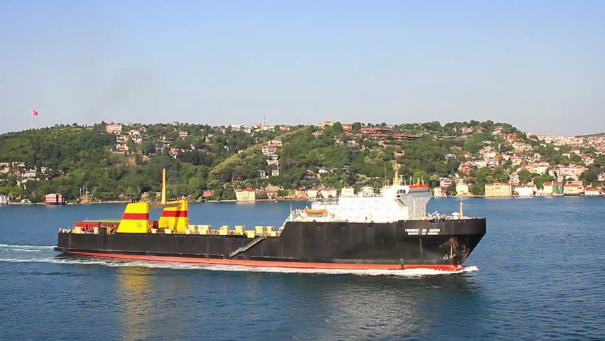 Ro-ro cargo ship sailing into open sea