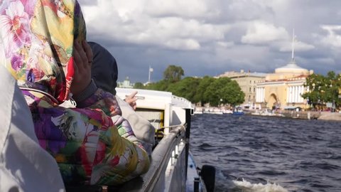 Tourists on a tour of the Neva River visiting the sights of the city. slow motion. 1920x1080. full hd