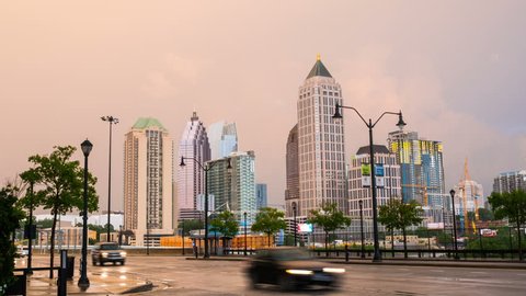Atlanta, USA. Time-lapse of Midtown in Atlanta, USA from evening to night. Car traffic, illuminated buildings and dark sky, rain