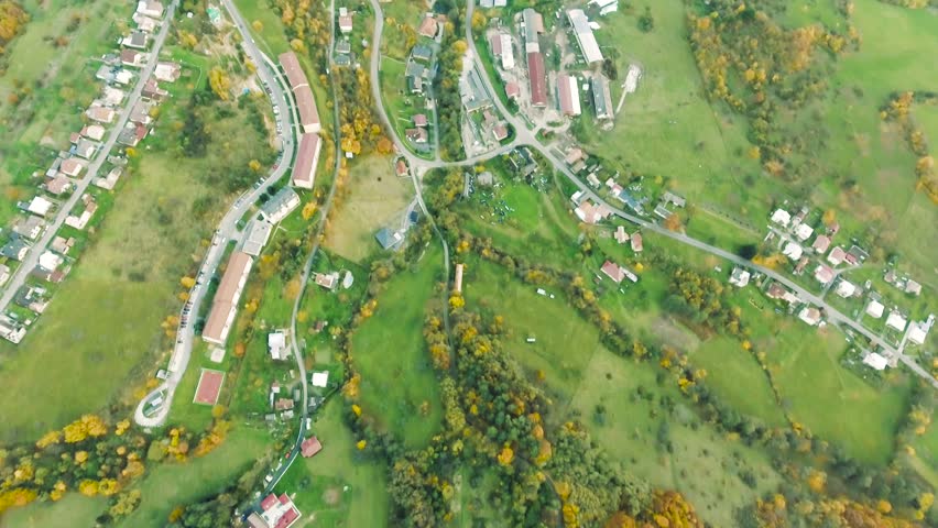 Aerial view of small town with hills, Slovakia. Autumn nature.