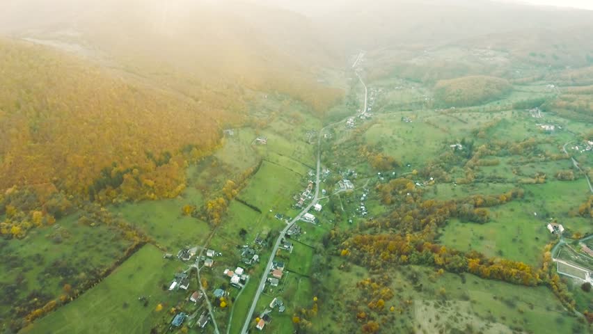 Aerial view of small town with hills, Slovakia. Autumn nature.