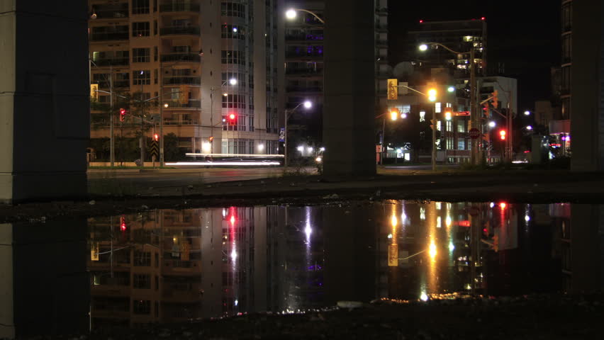Nighttime traffic light reflection time lapse 