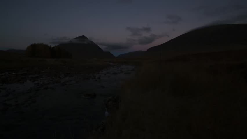 Timnelapse and video sequences showing an autumnal sunrise over Buachaille Etive Mor, a mountain in the highlands of Glencoe, Scotland.