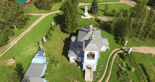 4K aerial video footage view of beautiful lone church near Ryazancevo village and area around it near Pereslavl-Zalesskiy on Golden Ring route 130 km from Moscow, Russia in summer day