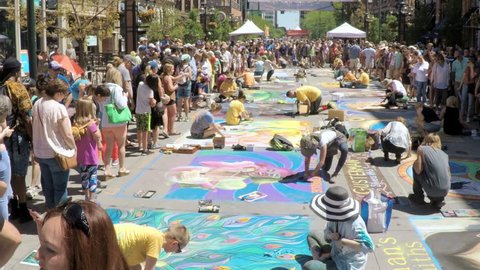 Denver, Colorado, USA-June 4, 2017.  POV point of view - Slow motion. Annual Chalk Festival on Larimer Square.