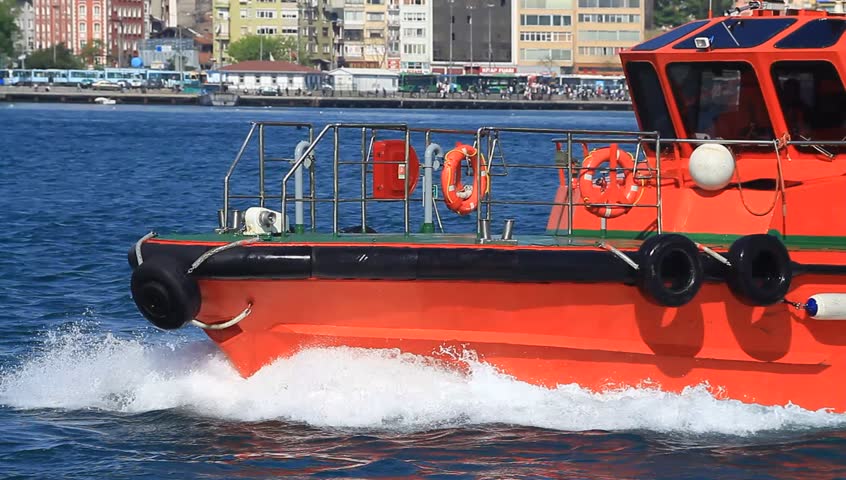 ISTANBUL - APRIL 28: Escort and ship handling tug boat KILAVUZ 1 sails into