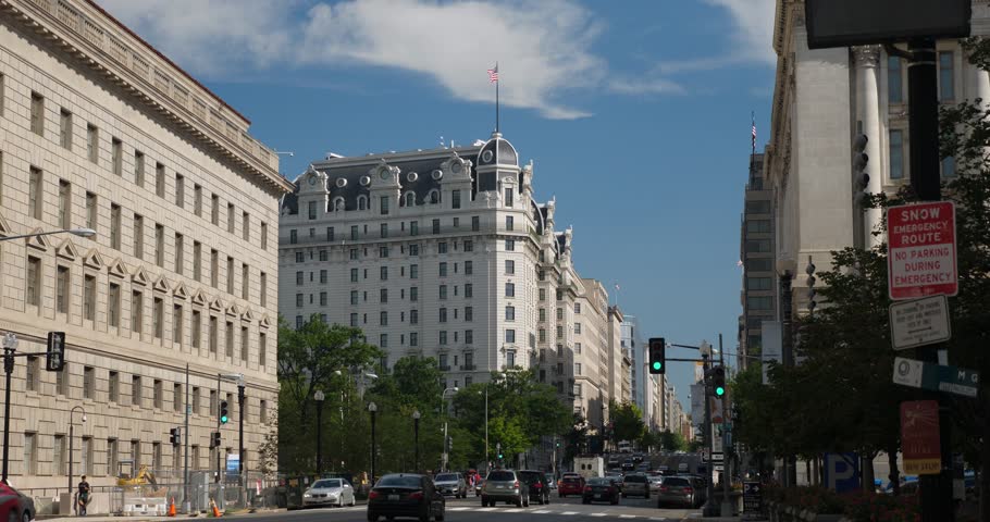 WASHINGTON, D.C. - Circa August, 2017 - A daytime summer exterior establishing shot of traffic along 14th Street in downtown Washington.  	