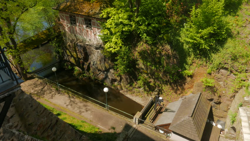Establishing shot of the medieval town of Cesky Krumlov in Czech Republic, Czechia, featuring traditional houses and the Vltava river