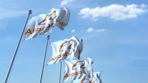 Waving flags with Alibaba logo against sky, seamless loop. 4K editorial animation