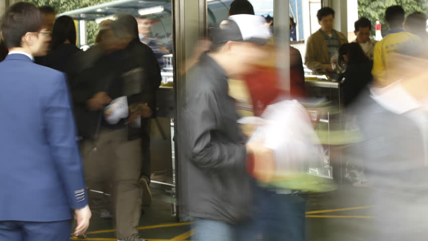 HONG KONG - DECEMBER 12: Crowd at entrance on December 12, 2010 in Hong Kong,