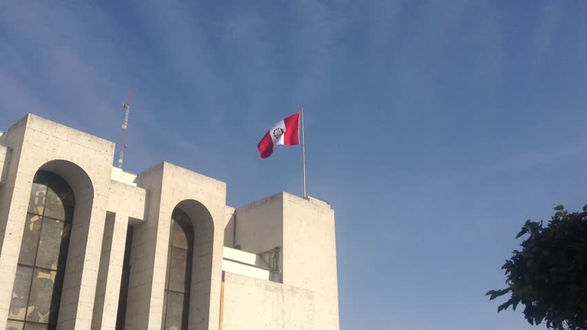 Peruvian flag on the building of justice.