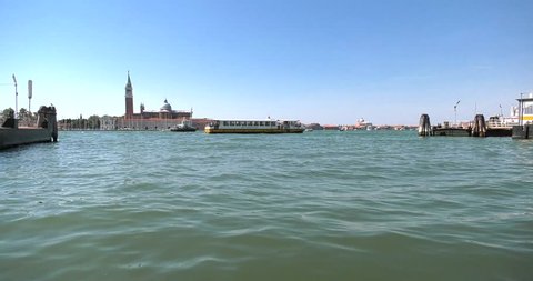Venice city in Italy with Boat traffic carries tourists on vacation and goods 