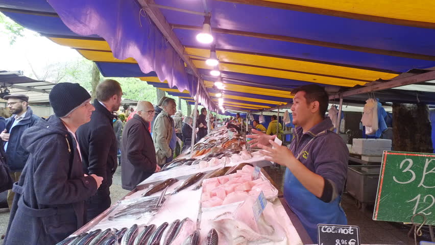 PARIS, FRANCE - circa MAY, 2017: Fresh fish on sale, Sunday market, La Bastille, Paris, France