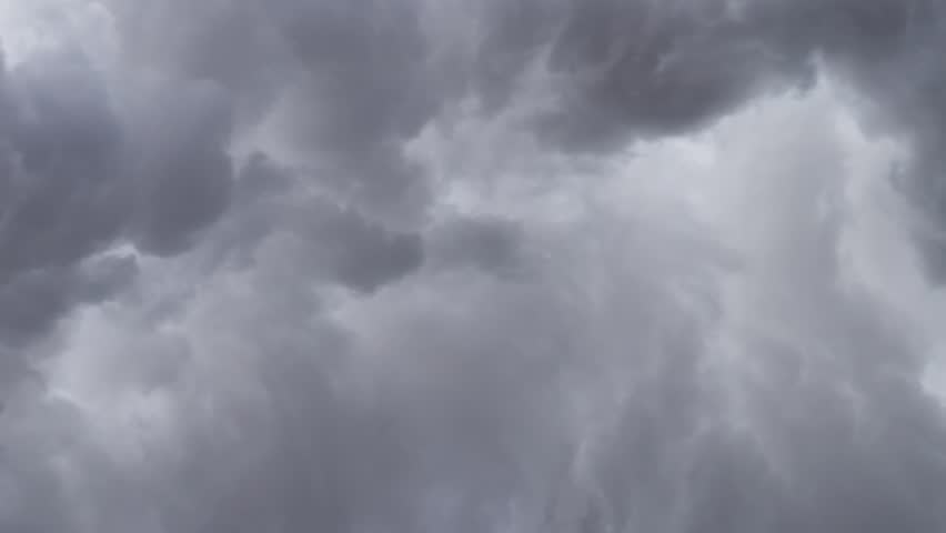 Billowing clouds of steam swirling across sky slow motion Royalty-Free Stock Footage #29962807