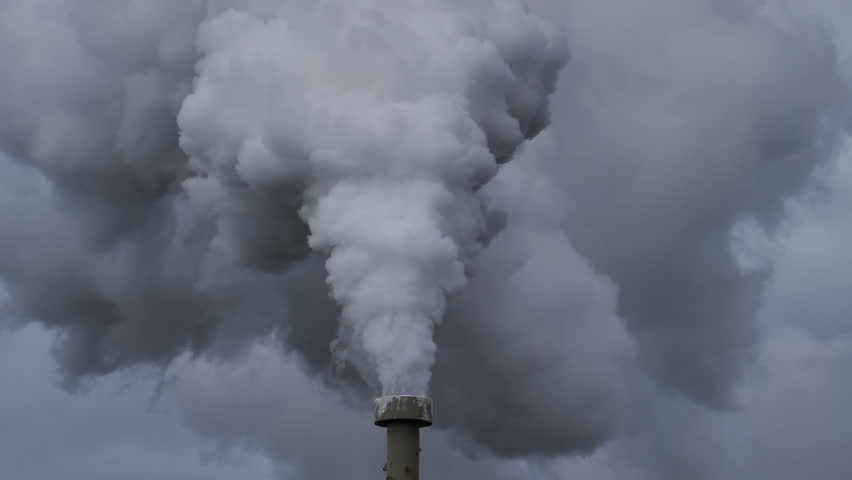 Billowing steam from smoke stack filling sky, super slow motion close up Royalty-Free Stock Footage #29962816