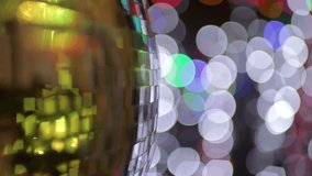 abstract funky discoball spinning with light effects and rays. perfect clip for club visuals or party/celebration