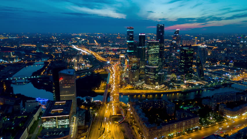 Sunset sky night light moscow city traffic ring road aerial panorama 4k time lapse russia