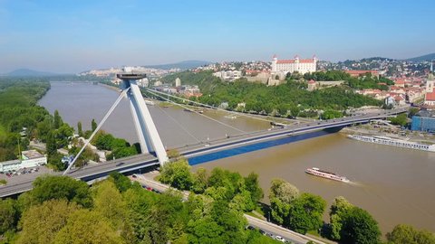 Most SNP new bridge or UFO Bridge or Novy Most aerial panoramic view in Bratislava, Slovakia. SNP Bridge is a road bridge over the Danube river.
