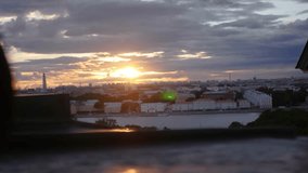 Time-lapse, beautiful sunset in the city on the background of houses and the river. full hd, 4k