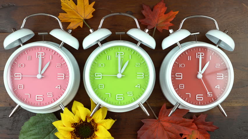 turning-the-clocks-back-one-stock-footage-video-100-royalty-free