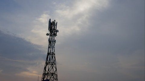 Time lapse or timelapse. A tower signal with blue sky and white cloud. Viet Nam