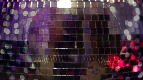 abstract funky discoball spinning with light effects and rays. perfect clip for club visuals or party/celebration