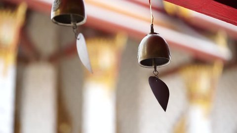 Small bell hangs around the corridor around the church in Thai temple