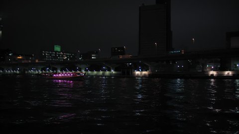 Boat on sumida river at night