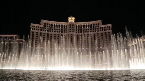 Las Vegas, Nevada - April 2017: Fountains of Bellagio. Fountains at Bellagio Hotel and Casino in Las Vegas. Bellagio fountain water show at night. Bellagio hotel and the dancing fountains.