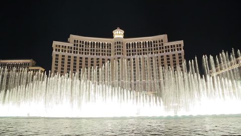 Las Vegas, Nevada - April 2017: Fountains at Bellagio Hotel and Casino in Las Vegas. Bellagio water fountain show in Las Vegas with original surround sound. Bellagio fountain water show at night.